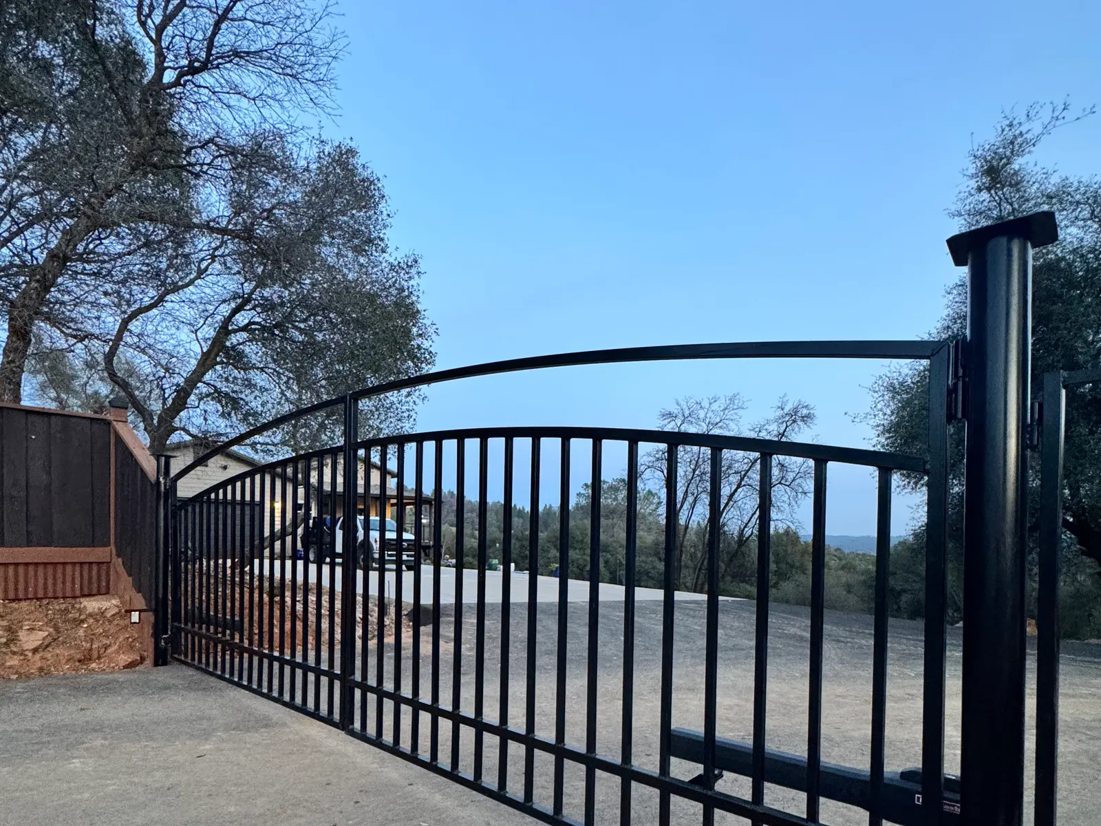 Automatic driveway gate serviced by LMS Garage Doors in the Sacramento area