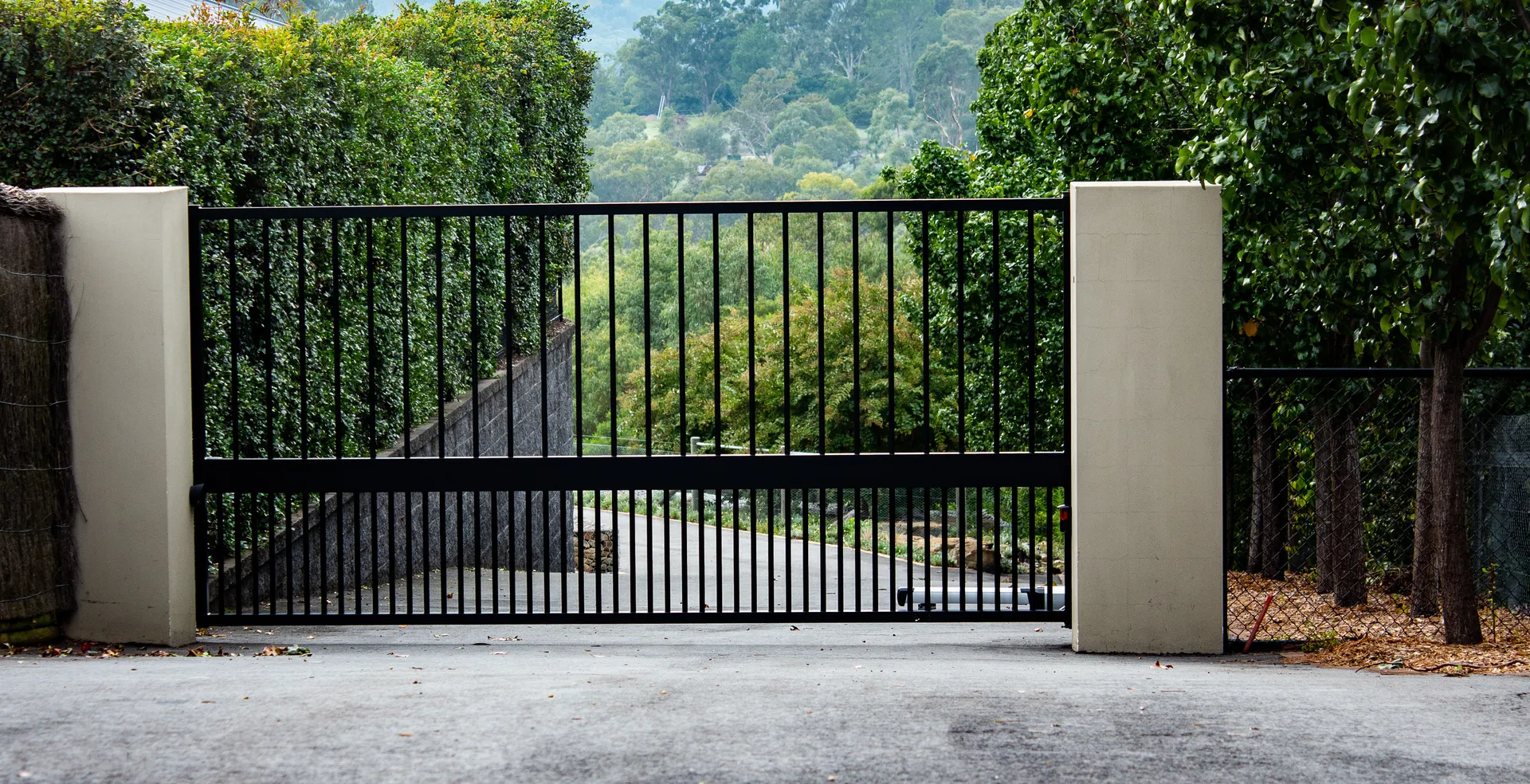 Residential driveway gate installed by LMS Garage Doors
