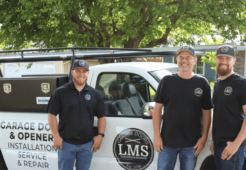 LMS Garage Doors crew in front of their service truck